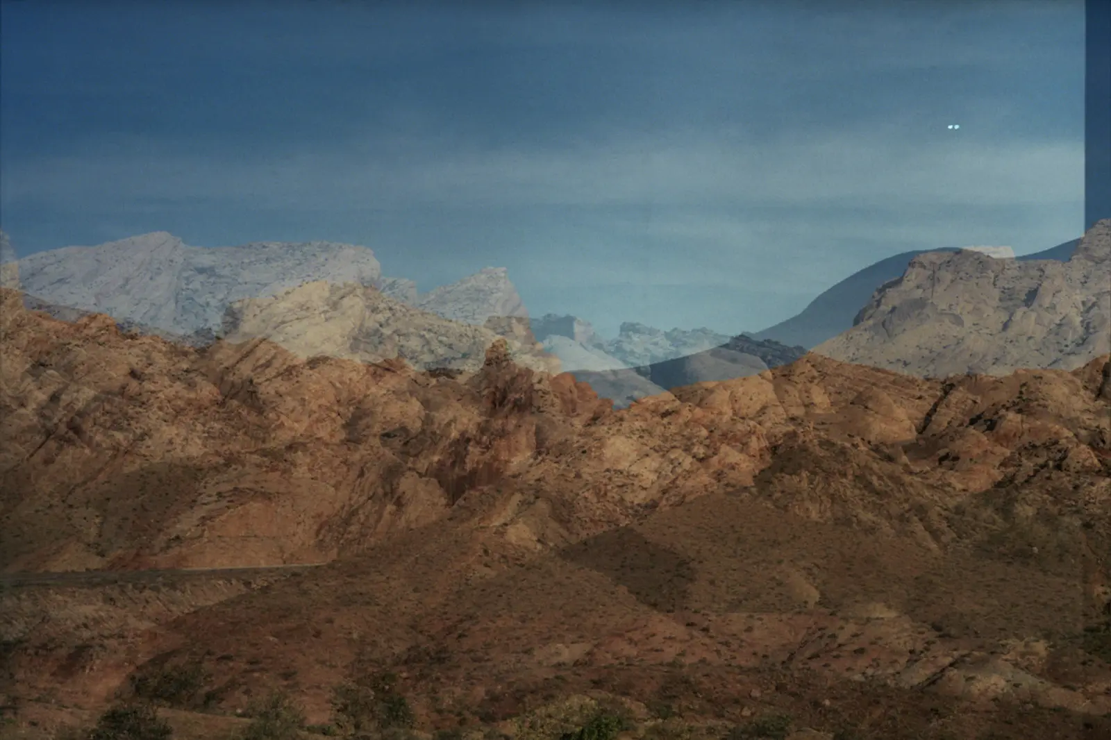 35mm double exposure of a mountain range in the American Southwest